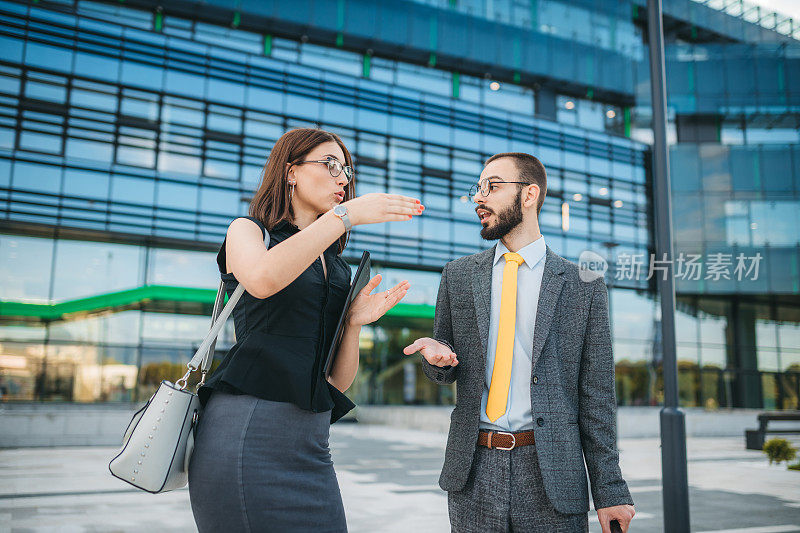 Colleagues in front of the office building